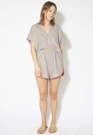 Front view of straight size model wearing Pebble Gray Double V Cropped Top.